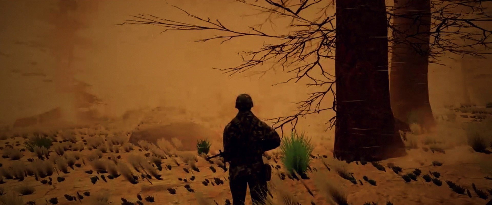 A soldier watching a dust storm roll across the desert, from the game
